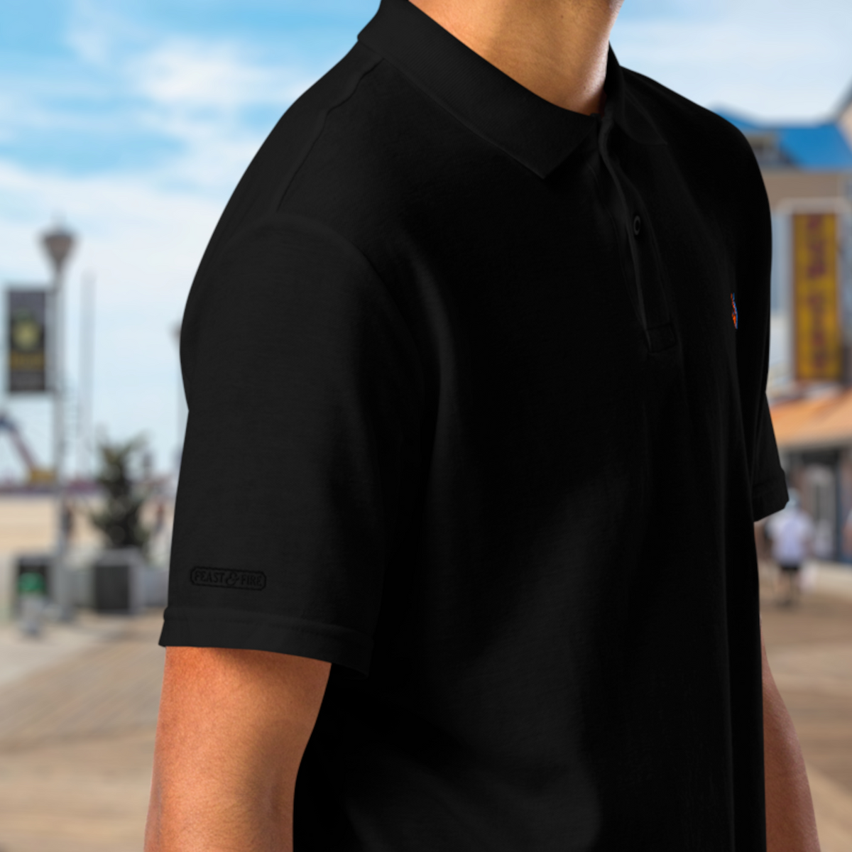 The Classic Pique Polo - BLACK - DOUBLE FLAME LOGO ORANGE ON BLUE